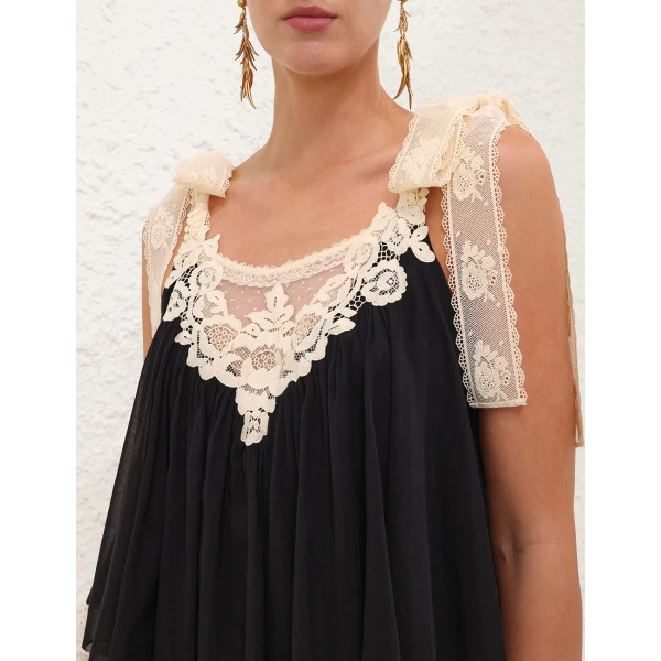 Elevate your elegance in this Zimmermann Tops available now at Luxury Shoes 