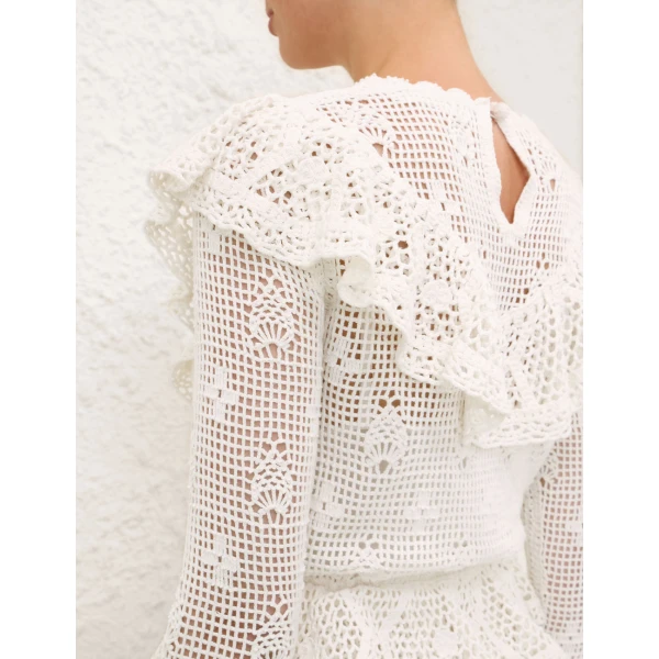 Elevate your elegance in this Zimmermann Dresses available now at Luxury Shoes 
