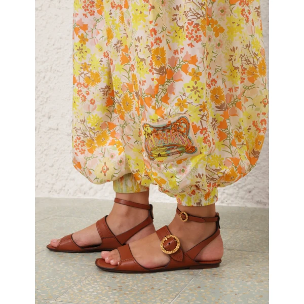 Elevate your elegance in this Zimmermann Jumpsuit available now at Luxury Shoes 