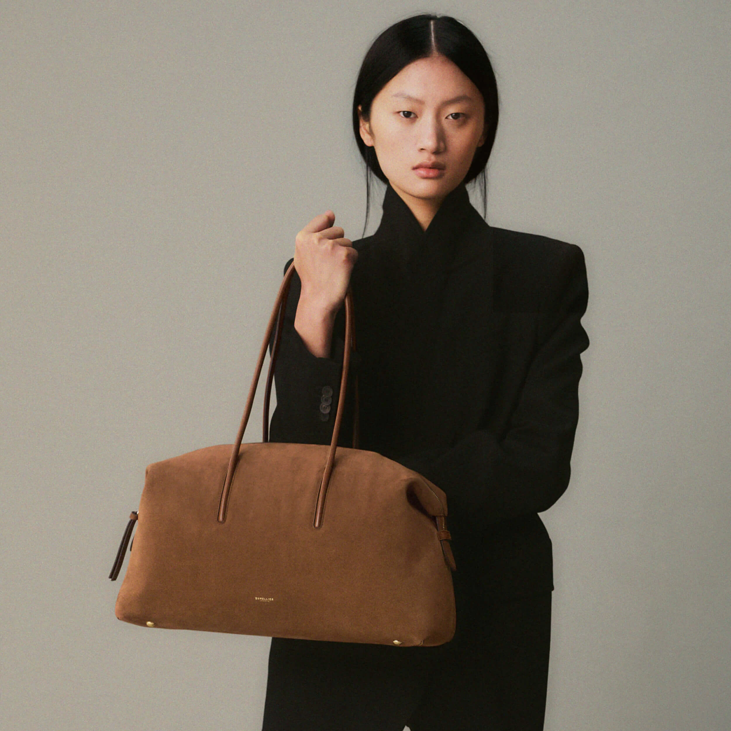 DeMellier The Stockholm shoulder bag in deep tan suede, handcrafted in Europe from gold-rated Italian leather