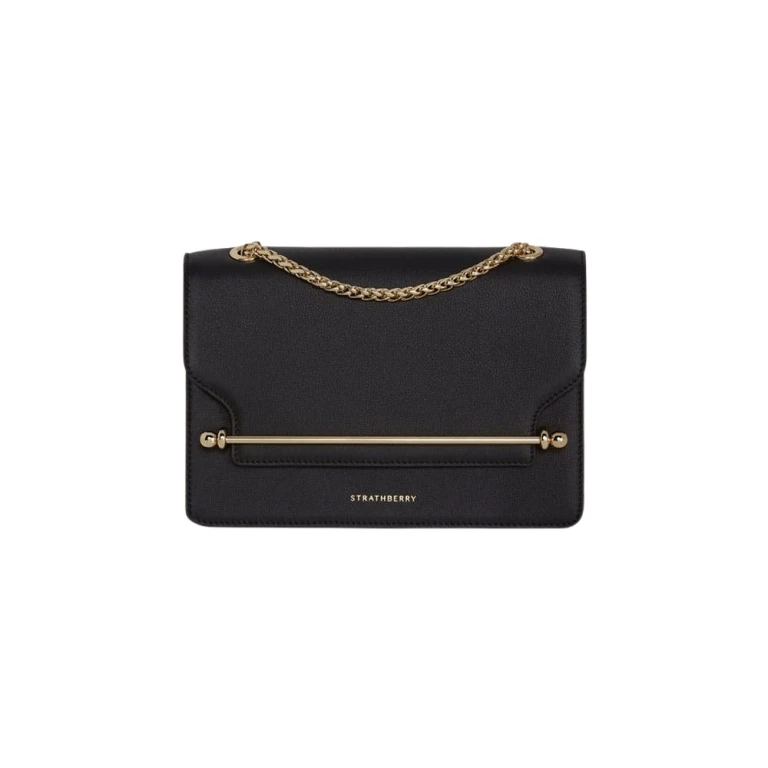 Strathberry East/West in black calf leather, the crossbody bag with the signature metal bar closure made globally known by Meghan Markle