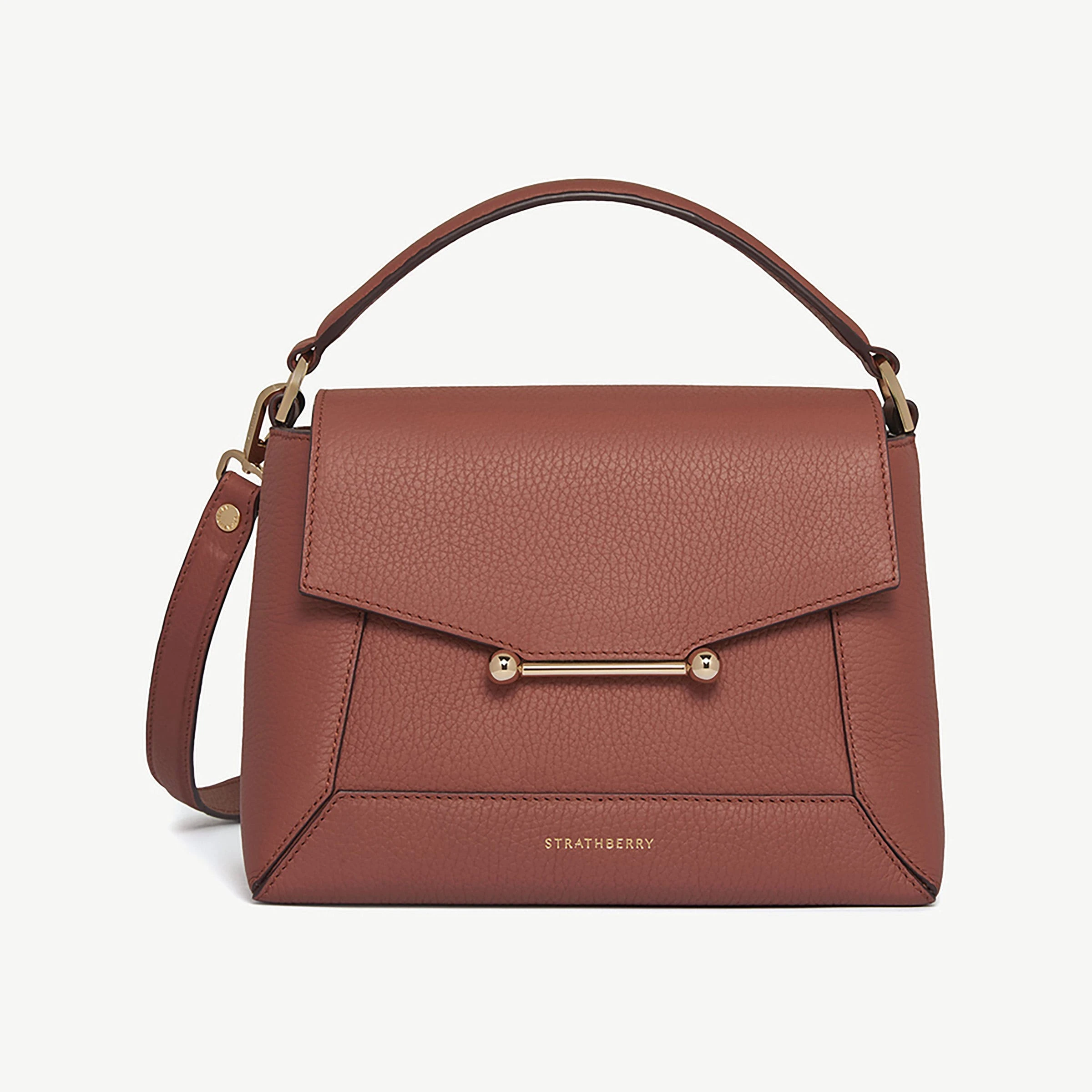 Strathberry Mosaic Bag in sienna leather, a structured top-handle bag with the signature gold metal bar closure, handcrafted in Spain