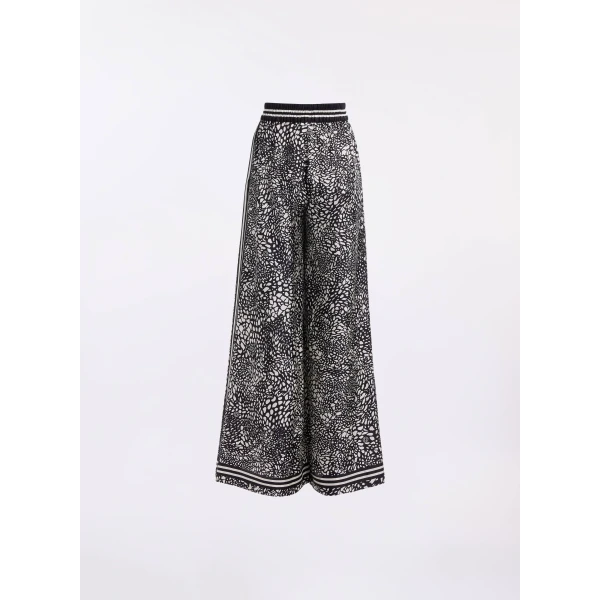designer trousers at Luxury Shoes 